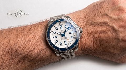 Breitling Superocean with white dial and blue bezel on a Straps&Style mesh bracelet