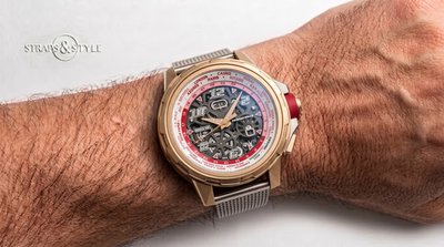 Richard Mille RM 63-02 World Timer in a round rose-gold case with a rotating city ring, red and white day-night ring and oversized date on a Straps&Style mesh bracelet