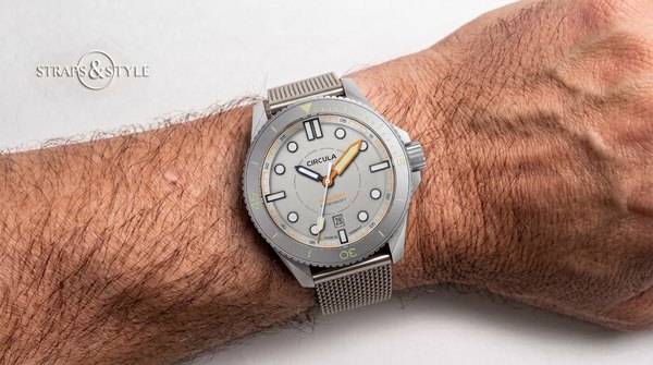 Circula DiveSport with grey dial and orange accents on a Straps&Style mesh bracelet