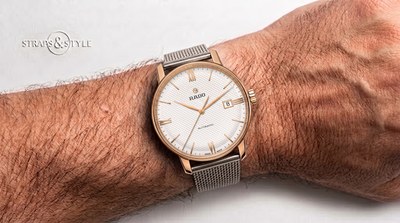 Rado Coupole Classic automatic in rose gold tone with a white waffle-patterned dial, applied Roman numerals and a date at three on a Straps&Style mesh bracelet
