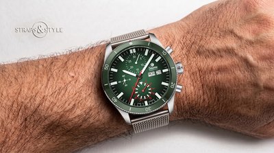 Tutima chronograph with an olive green dial, three subdials, day-date at three and a rotating timing bezel on a Straps&Style mesh bracelet