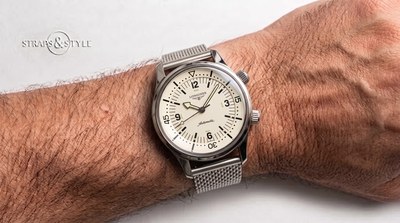 Longines Legend Diver with a cream dial, luminous numerals, twin crowns and an inner dive scale on a steel mesh bracelet