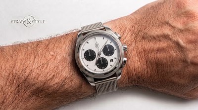 Parmigiani Fleurier chronograph with a silver-white dial, contrasting black sub-dials and a date at half past four on a Straps&Style mesh bracelet