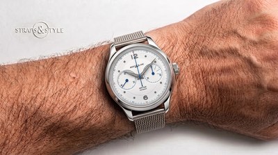 Montblanc Heritage chronograph with a silvery-white dial, twin sub-dials with blue hands and a smooth steel bezel on a Straps&Style mesh bracelet