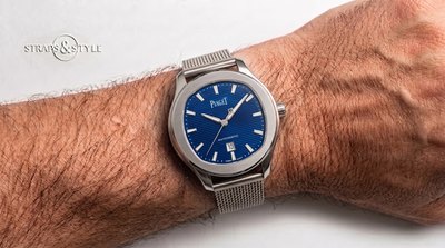 Piaget Polo with a sunburst blue grooved dial, steel case and a date aperture at six on a Straps&Style mesh bracelet